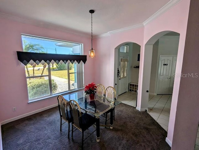 tiled dining room with crown molding