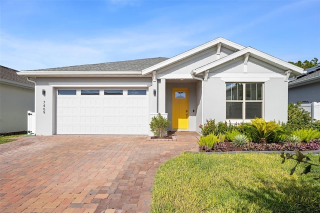 view of front of home featuring a garage