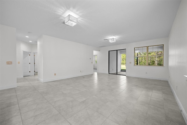 empty room featuring light tile patterned flooring