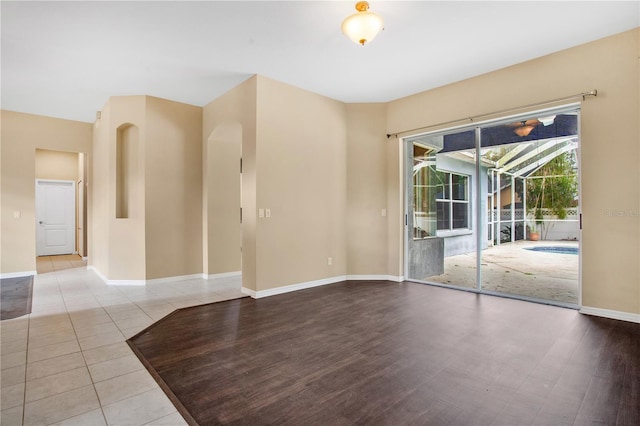 empty room with light tile patterned floors