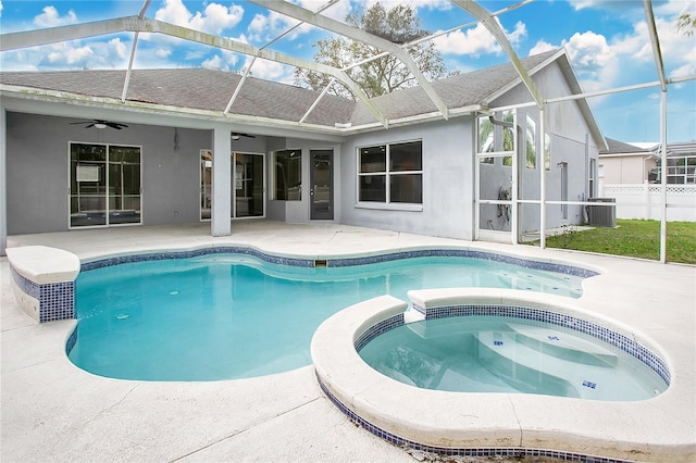 view of pool featuring an in ground hot tub, a lanai, ceiling fan, central AC unit, and a patio