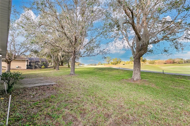 view of yard featuring a lanai