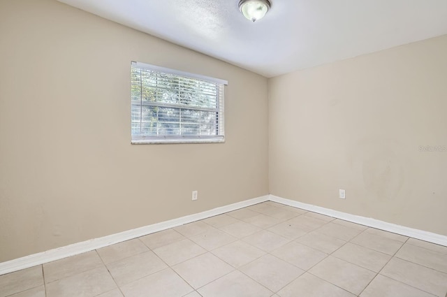 view of tiled spare room