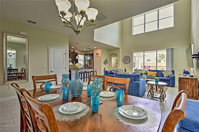 dining room featuring a notable chandelier