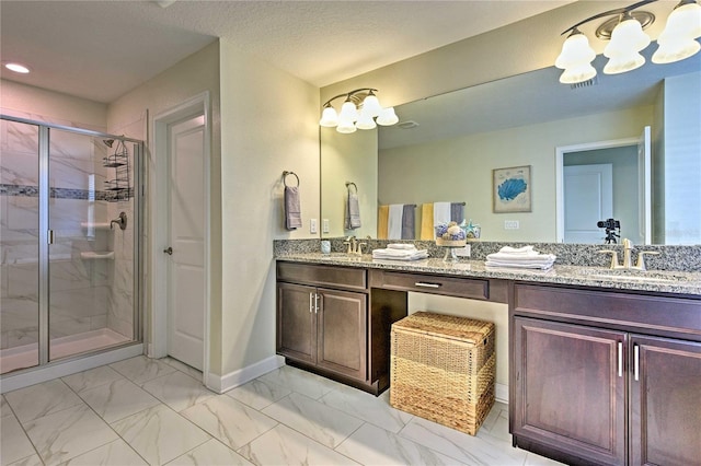 1636 Moon Valley Dr, Davenport, FL 33896 - full bathroom featuring marble finish floors, a stall shower, double vanity, a chandelier, and recessed lighting
