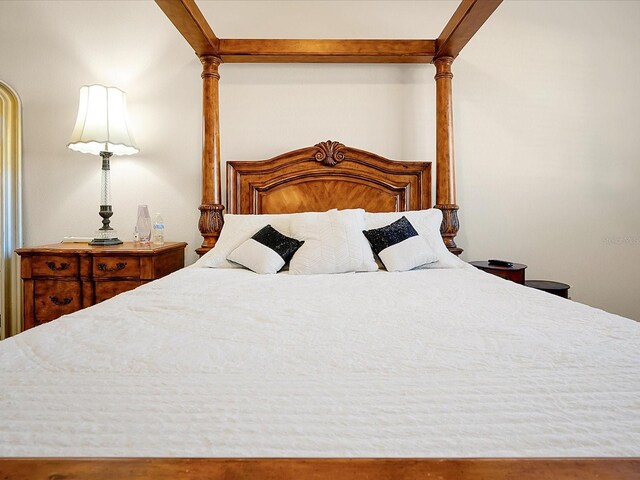 bedroom with decorative columns