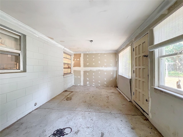 interior space with crown molding