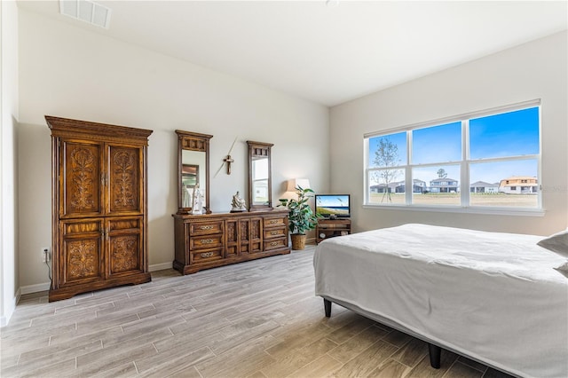 bedroom featuring light wood-type flooring