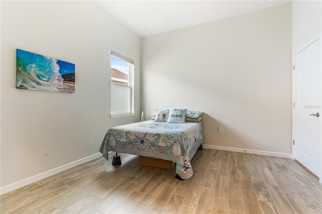 bedroom featuring hardwood / wood-style flooring