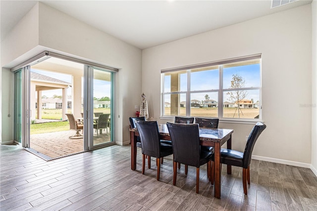 dining area featuring hardwood / wood-style flooring