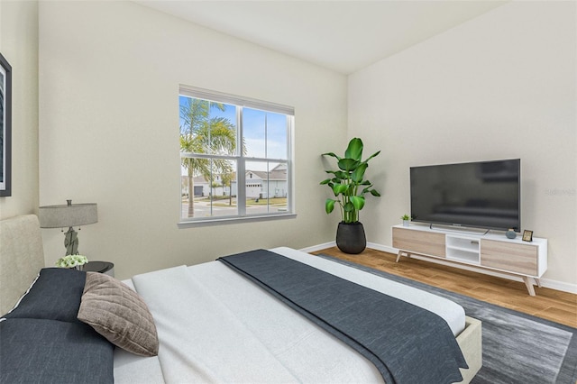 bedroom featuring hardwood / wood-style floors