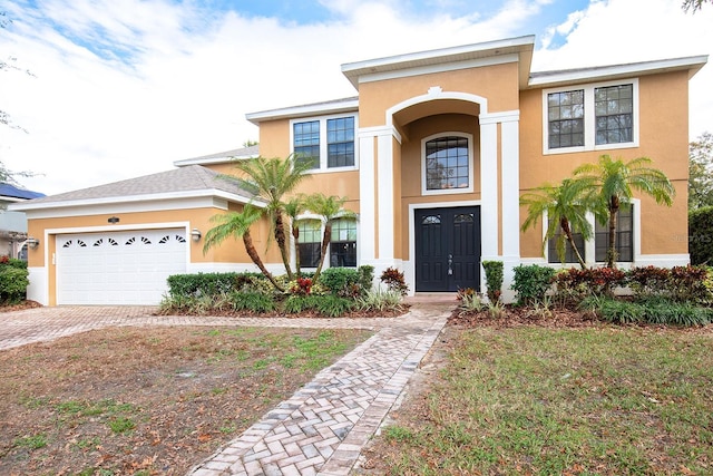 view of front of home featuring a garage