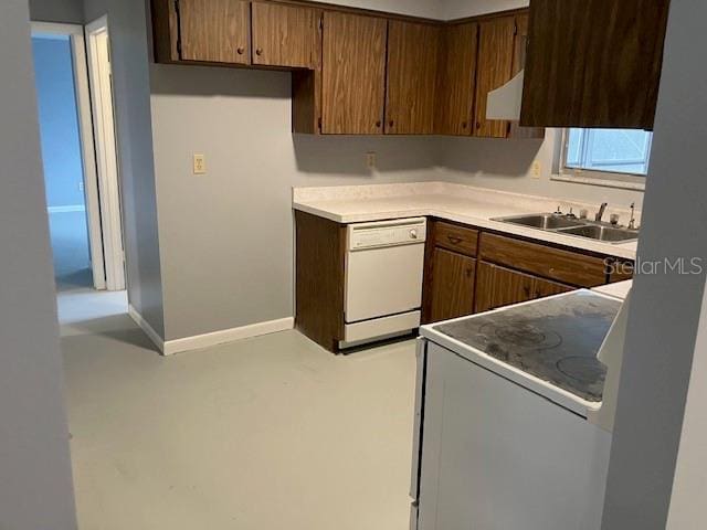 kitchen with sink, range with electric cooktop, and white dishwasher