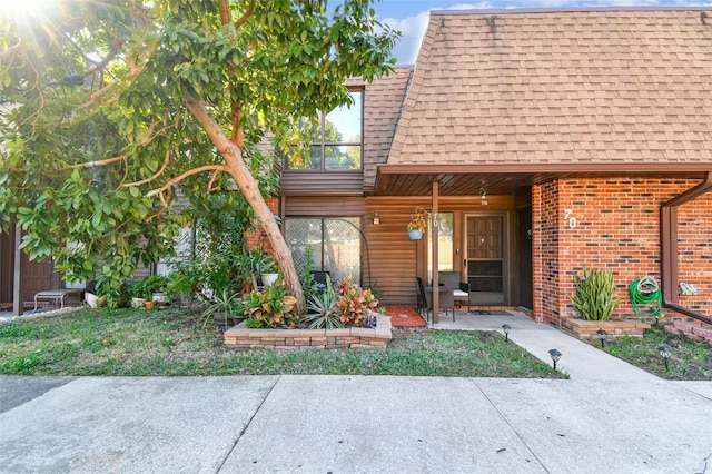 doorway to property with a patio area and a balcony