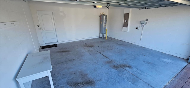 garage with electric panel, a garage door opener, and water heater