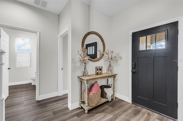 foyer entrance featuring dark hardwood / wood-style flooring