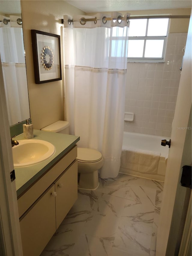 full bathroom featuring vanity, toilet, and shower / tub combo