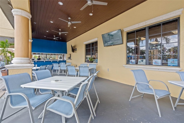 view of patio featuring ceiling fan