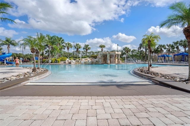 view of pool featuring pool water feature