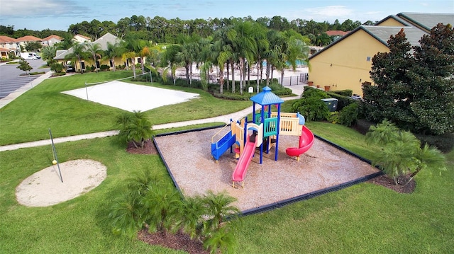 view of play area featuring volleyball court and a yard