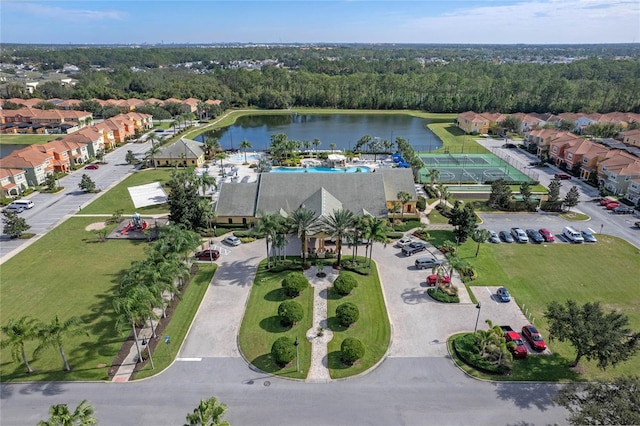 birds eye view of property featuring a water view