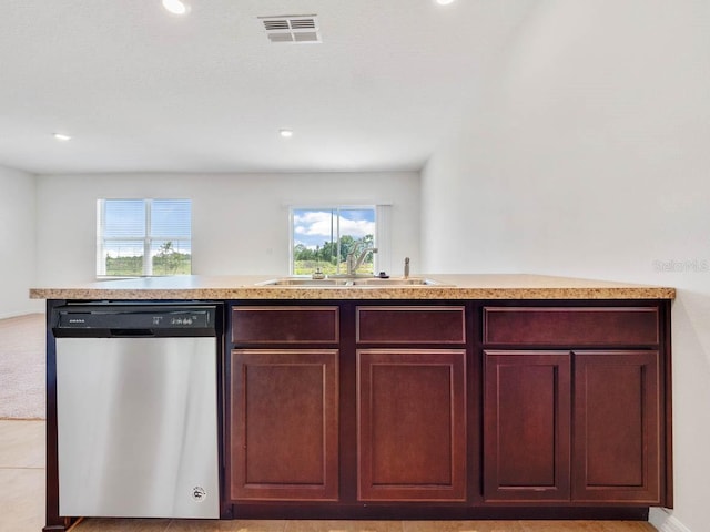 kitchen featuring dishwasher and sink