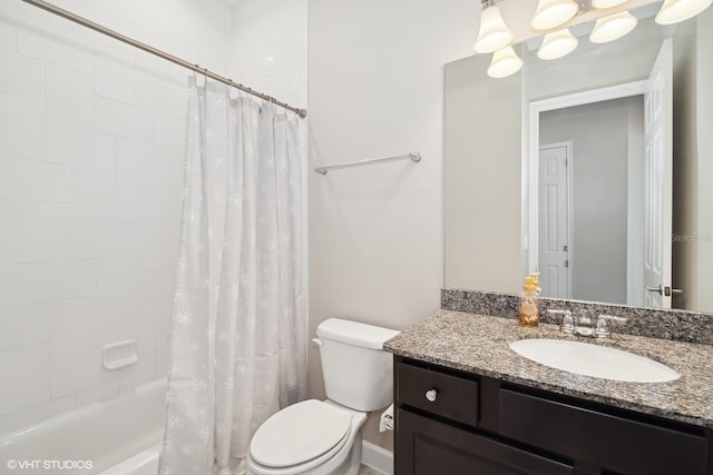 full bathroom featuring shower / bath combo, toilet, and vanity