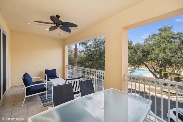 exterior space featuring ceiling fan