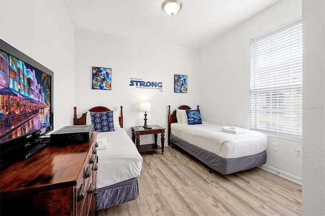 bedroom featuring light wood-type flooring