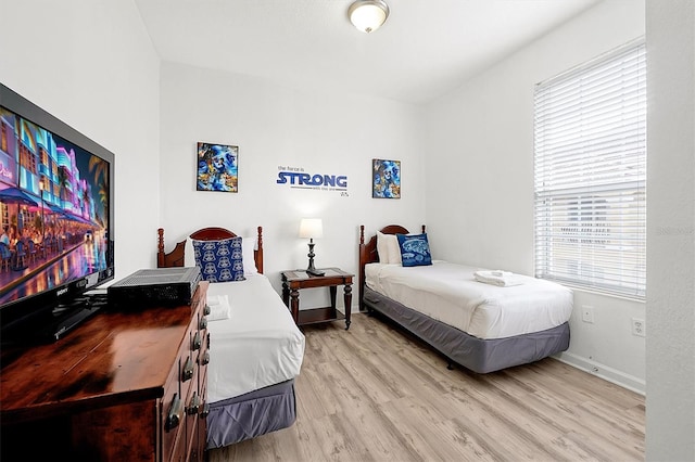 4814 Cayview Ave Unit 40613, Orlando, FL 32819 - bedroom with wood finished floors and baseboards