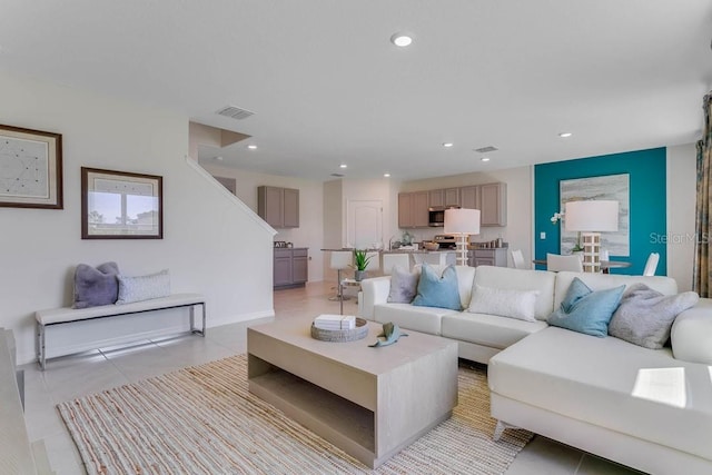 living room featuring light tile patterned flooring