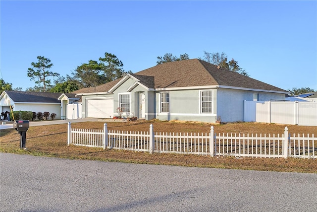 single story home featuring a garage