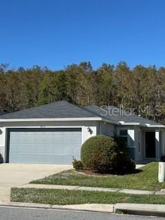 single story home featuring a garage