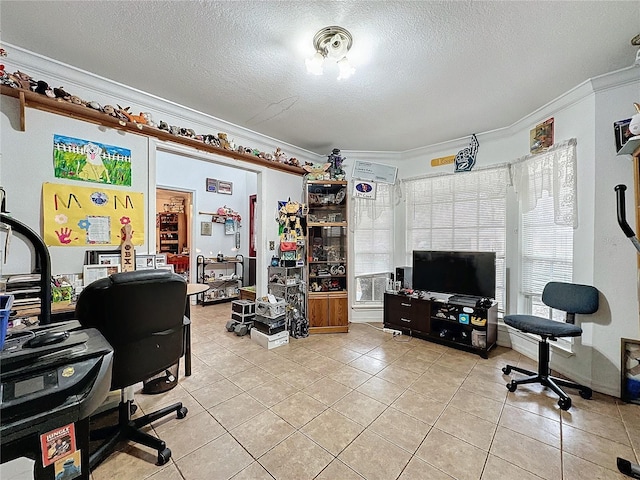 tiled home office featuring a textured ceiling and ornamental molding