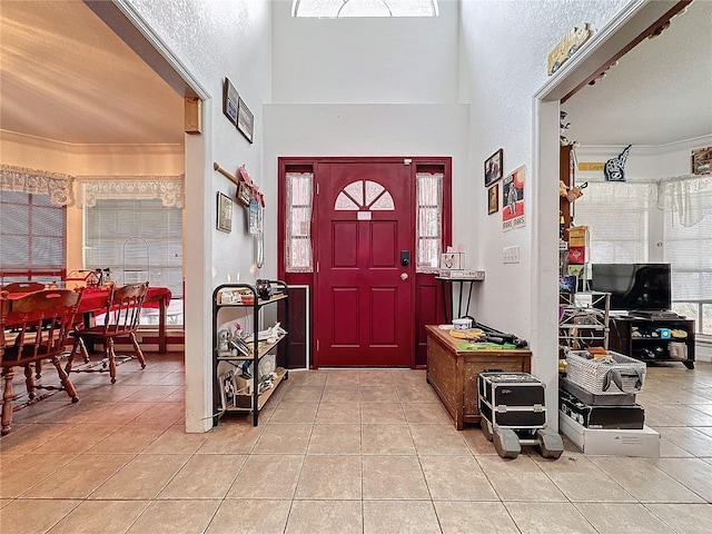 entryway with light tile patterned floors