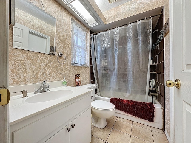 full bathroom with tile patterned floors, shower / bath combination with curtain, toilet, and vanity