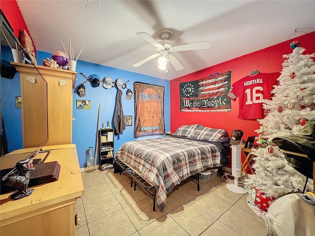 bedroom featuring ceiling fan and light tile patterned flooring