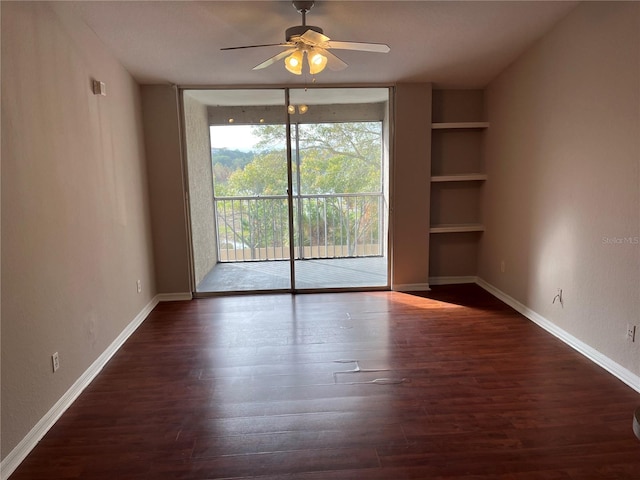 interior space featuring ceiling fan, dark hardwood / wood-style floors, and built in features