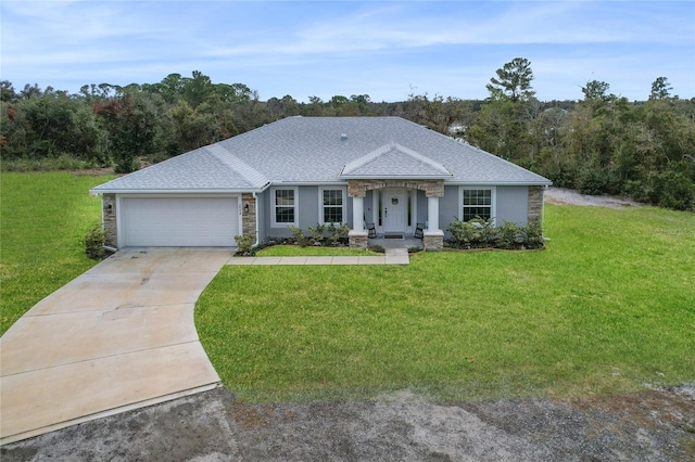 single story home with a garage and a front yard