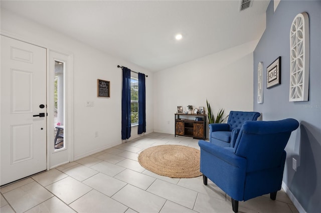 view of tiled foyer entrance