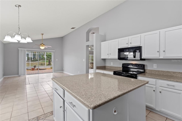 kitchen featuring black appliances, ceiling fan with notable chandelier, white cabinets, light tile patterned floors, and a kitchen island