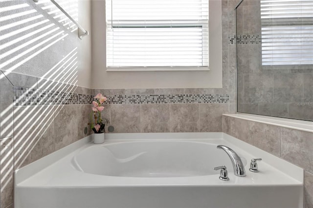 bathroom with a tub