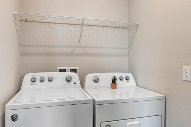 washroom with washer and clothes dryer