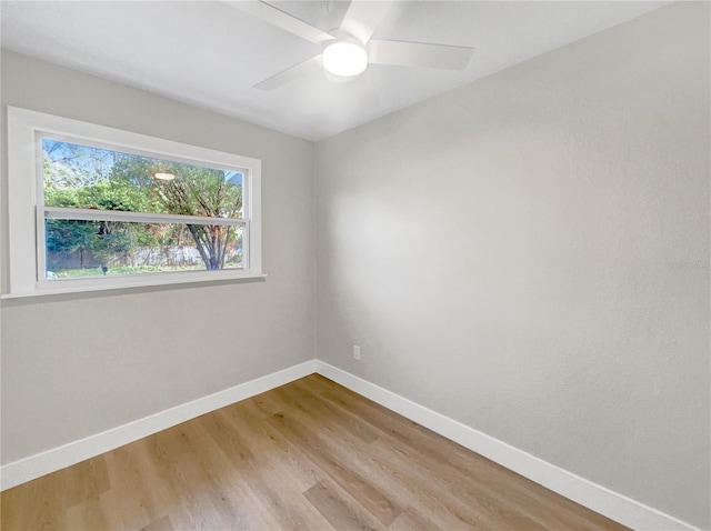 unfurnished room featuring ceiling fan and light hardwood / wood-style floors