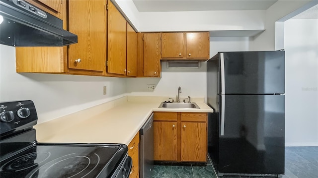 kitchen with black appliances, brown cabinetry, a sink, and under cabinet range hood