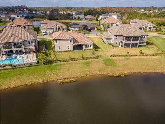 drone / aerial view with a water view