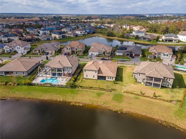 drone / aerial view with a water view