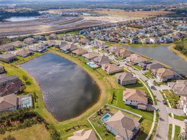 aerial view featuring a water view