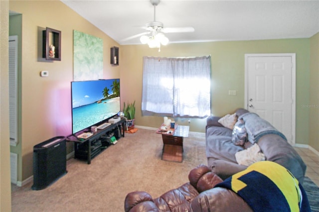 living room featuring ceiling fan, lofted ceiling, and light carpet