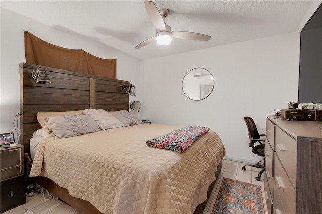 bedroom featuring ceiling fan and light hardwood / wood-style floors